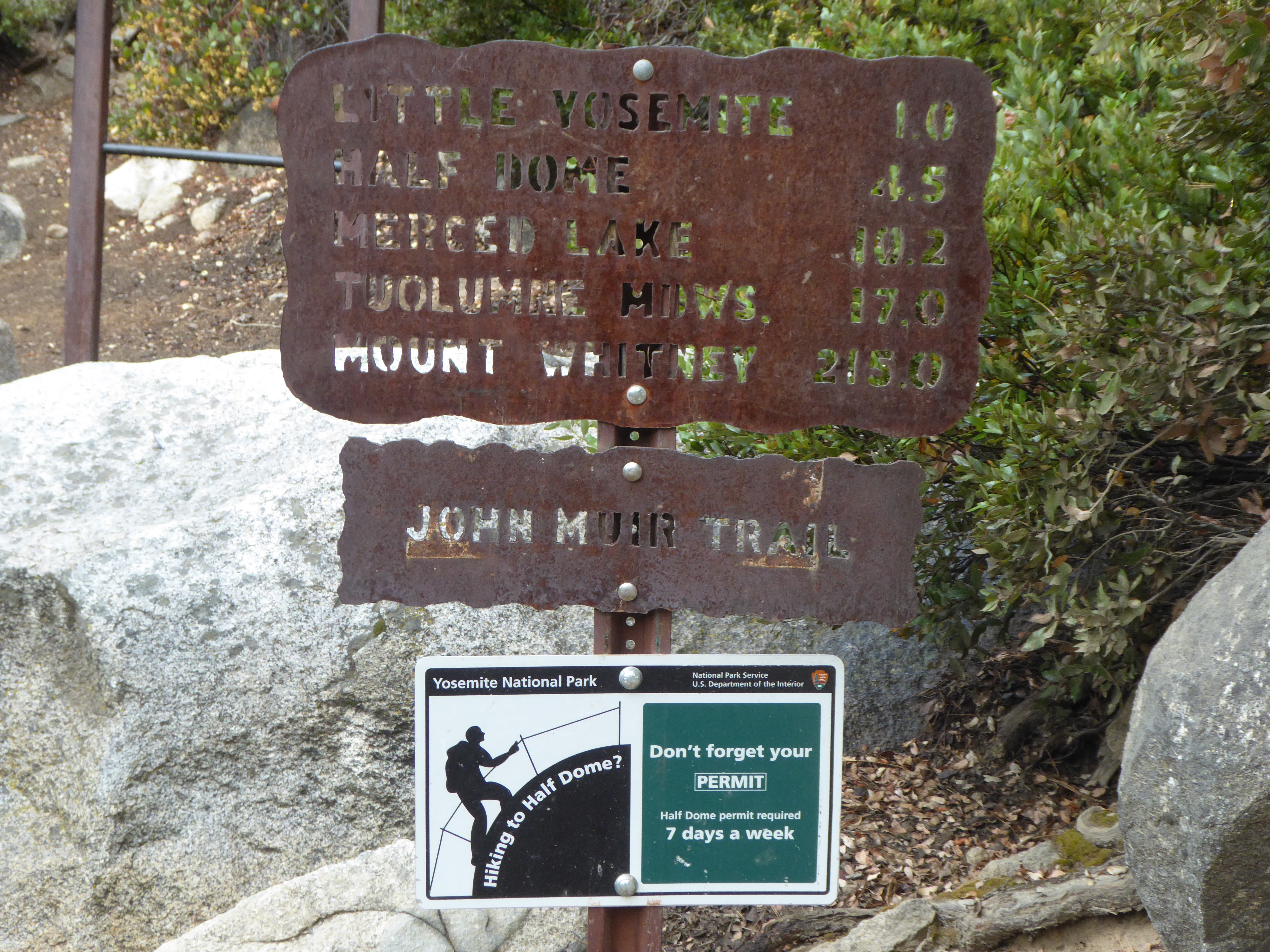 John Muir trail signs remind hikers to carry their permits